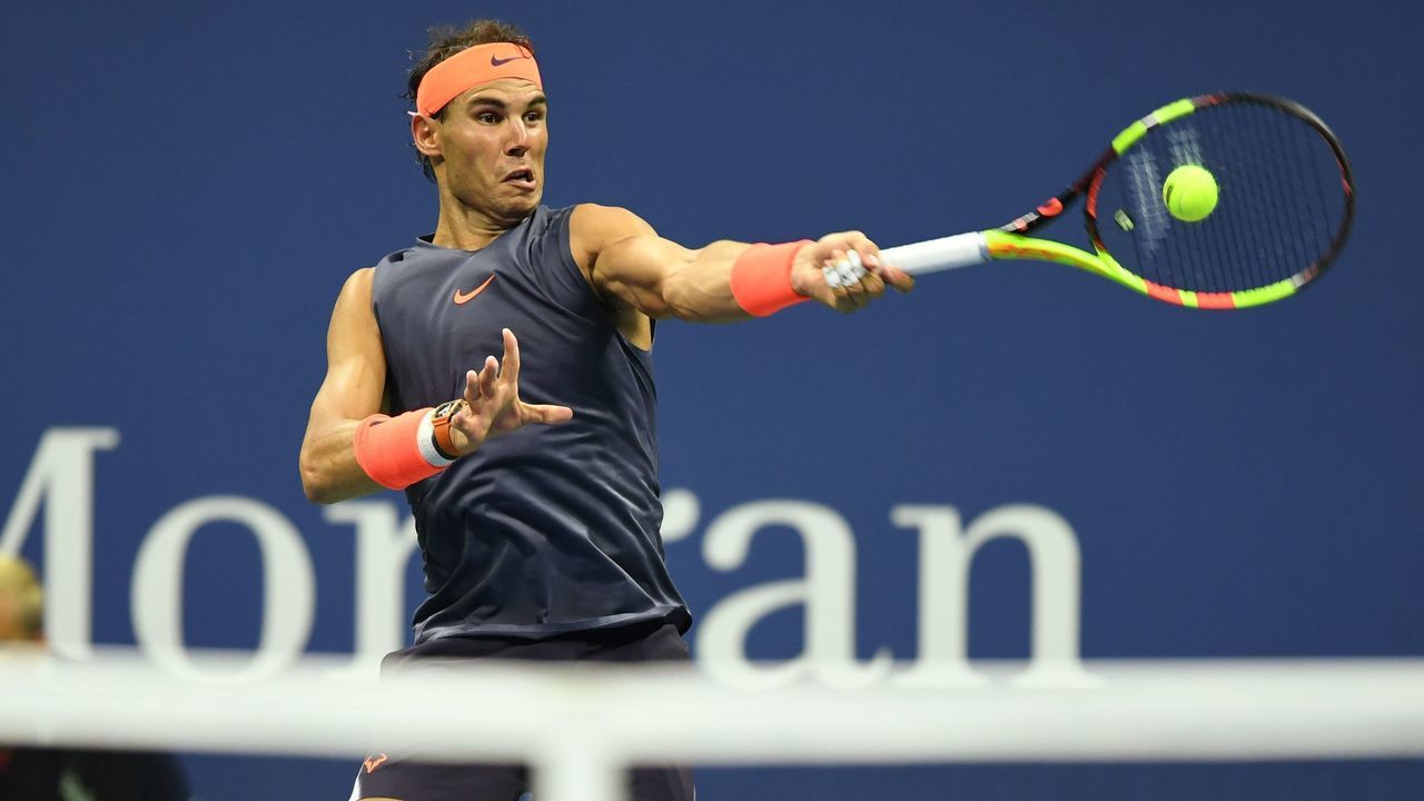 Spain's Rafael Nadal returns the ball to Austria's Dominic Thiem during their Men's Singles Quarter-Finals match at the 2018 US Open at the USTA Billie Jean King National Tennis Center in New York on September 4, 2018.