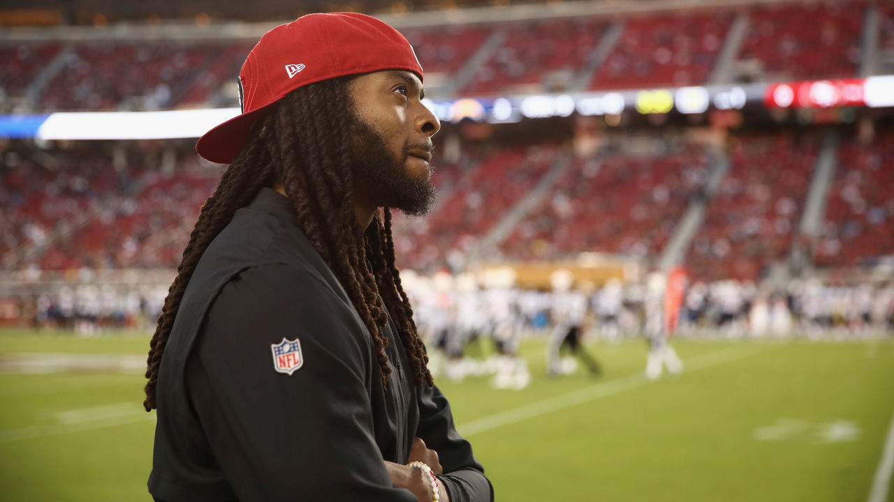 SANTA CLARA, CA - AUGUST 30: Richard Sherman #25 of the San Francisco 49ers watches a replay on the big screen during their preseason game against the Los Angeles Chargers at Levi's Stadium on August 30, 2018 in Santa Clara, California.