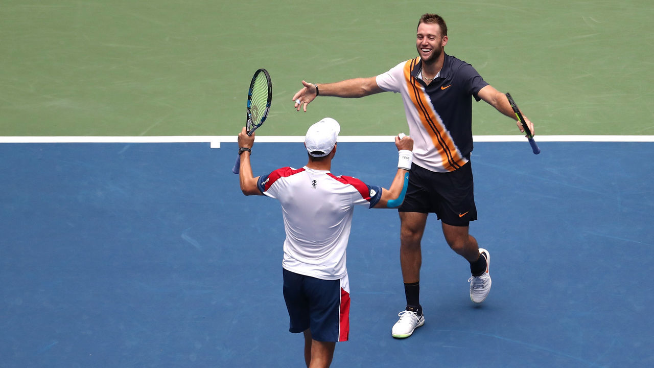 NEW YORK, NY - SEPTEMBER 07: Jack Sock and Mike Bryan of The United States celebrate match point during the men's doubles final against Lukasz Kubot of Poland and Marcelo Melo of Brazil on Day Twelve of the 2018 US Open at the USTA Billie Jean King National Tennis Center on September 7, 2018 in the Flushing neighborhood of the Queens borough of New York City.
