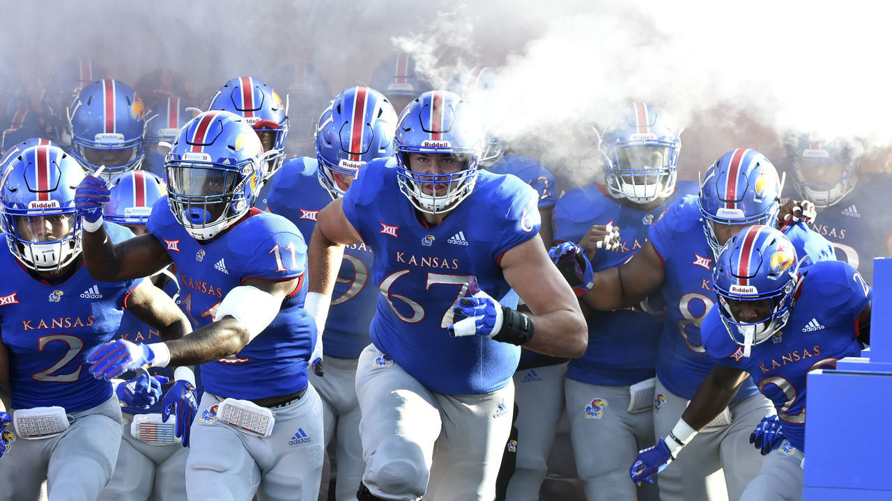 LAWRENCE, KS - SEPTEMBER 1: Members of the Kansas Jayhawks run onto the field prior to a game against the Nicholls State Colonels in the first quarter at Memorial Stadium on September 1, 2018 in Lawrence, Kansas.