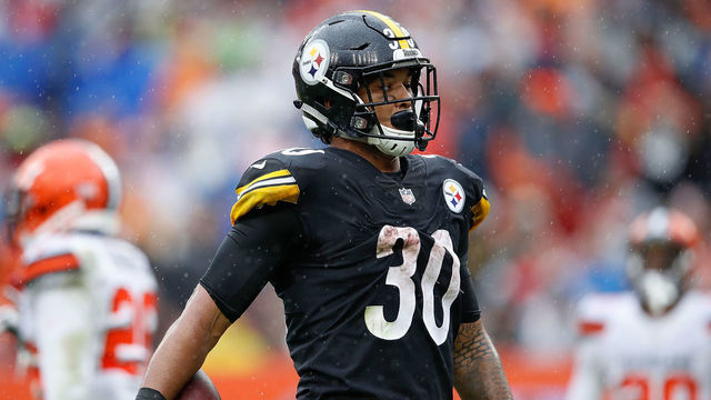 CLEVELAND, OH - SEPTEMBER 09: James Conner #30 of the Pittsburgh Steelers holds the ball after rushing for a touchdown during the second quarter against the Cleveland Browns at FirstEnergy Stadium on September 9, 2018 in Cleveland, Ohio.