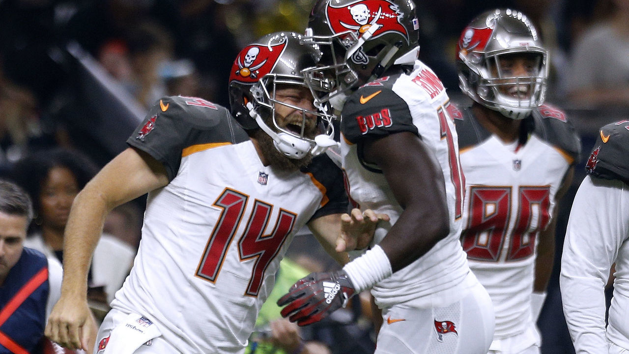 NEW ORLEANS, LA - SEPTEMBER 09: Ryan Fitzpatrick #14 of the Tampa Bay Buccaneers celebrates a touchdown with Justin Watson #17 during the first half against the New Orleans Saints at the Mercedes-Benz Superdome on September 9, 2018 in New Orleans, Louisiana.