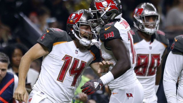 NEW ORLEANS, LA - SEPTEMBER 09: Ryan Fitzpatrick #14 of the Tampa Bay Buccaneers celebrates a touchdown with Justin Watson #17 during the first half against the New Orleans Saints at the Mercedes-Benz Superdome on September 9, 2018 in New Orleans, Louisiana.