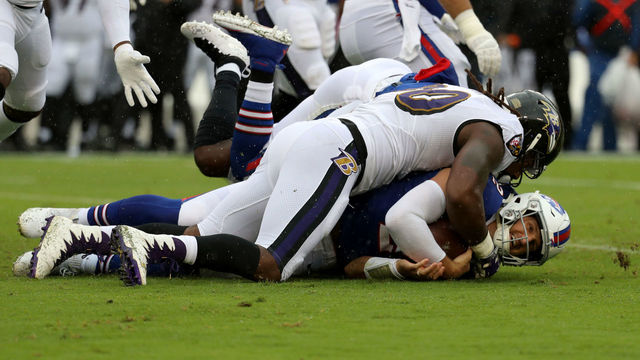 BALTIMORE, MD - SEPTEMBER 9: Nathan Peterman #2 of the Buffalo Bills is tackled by Za'Darius Smith #90 of the Baltimore Ravens in the first quarter at M&T Bank Stadium on September 9, 2018 in Baltimore, Maryland.