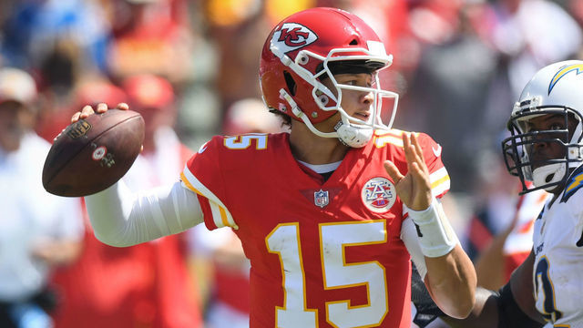 CARSON, CA - SEPTEMBER 09: Quarterback Patrick Mahomes #15 of the Kansas City Chiefs throws for a touchdown to take a 14-3 lead in the first quarter against the Los Angeles Chargers at StubHub Center on September 9, 2018 in Carson, California.