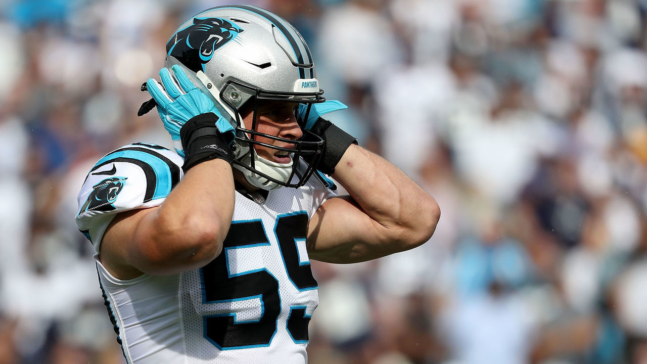 CHARLOTTE, NC - SEPTEMBER 09: Luke Kuechly #59 of the Carolina Panthers listens to a play call against the Dallas Cowboys in the first quarter during their game at Bank of America Stadium on September 9, 2018 in Charlotte, North Carolina.