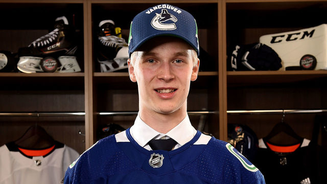 CHICAGO, IL - JUNE 23: Elias Pettersson poses for a portrait after being selected fifth overall by the Vancouver Canucks during the 2017 NHL Draft at the United Center on June 23, 2017 in Chicago, Illinois.