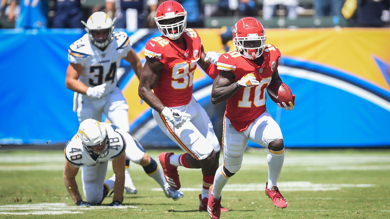 CARSON, CA - SEPTEMBER 09: Wide receiver Tyreek Hill #10 of the Kansas City Chiefs runs the ball for a touchdown in the first quarter against the Los Angeles Chargers at StubHub Center on September 9, 2018 in Carson, California.