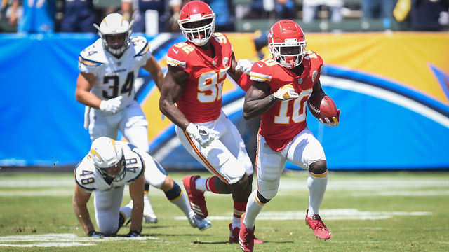 CARSON, CA - SEPTEMBER 09: Wide receiver Tyreek Hill #10 of the Kansas City Chiefs runs the ball for a touchdown in the first quarter against the Los Angeles Chargers at StubHub Center on September 9, 2018 in Carson, California.