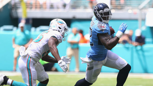 MIAMI, FL - SEPTEMBER 09: Tight End Delanie Walker #82 of the Tennessee Titans runs after the catch against Jerome Baker #55 of the Miami Dolphins at Hard Rock Stadium on September 9, 2018 in Miami, Florida.