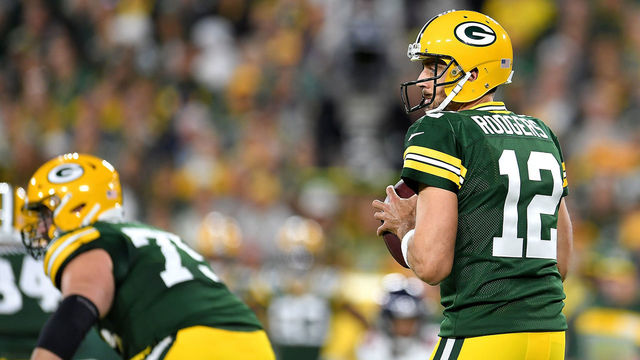 GREEN BAY, WI - SEPTEMBER 09: Aaron Rodgers #12 of the Green Bay Packers drops back to pass during the first quarter of a game against the Chicago Bears at Lambeau Field on September 9, 2018 in Green Bay, Wisconsin.