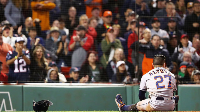 BOSTON, MA - September 9: Jose Altuve #27 of the Houston Astros reacts after he is tagged out at home plate in the seventh inning of a game against the Boston Red Sox at Fenway Park on September 9, 2018 in Boston, Massachusetts.