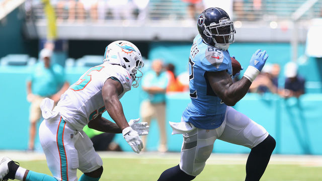 MIAMI, FL - SEPTEMBER 09: Tight End Delanie Walker #82 of the Tennessee Titans runs after the catch against Jerome Baker #55 of the Miami Dolphins at Hard Rock Stadium on September 9, 2018 in Miami, Florida.