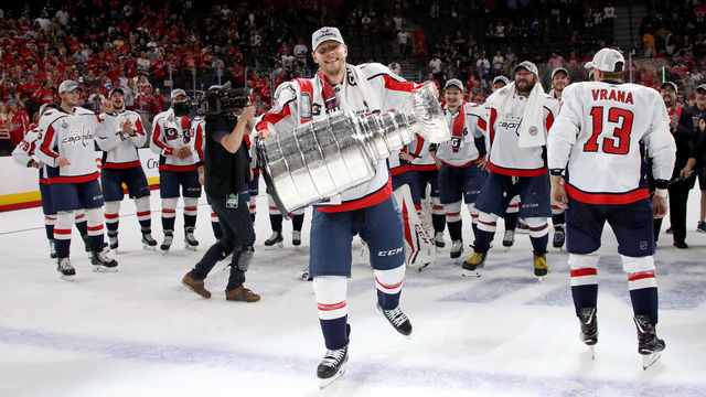 LAS VEGAS, NV - JUNE 07: Alex Chiasson #39 of the Washington Capitals hoists the Stanley Cup after his team defeated the Vegas Golden Knights 4-3 in Game Five of the 2018 NHL Stanley Cup Final at T-Mobile Arena on June 7, 2018 in Las Vegas, Nevada.