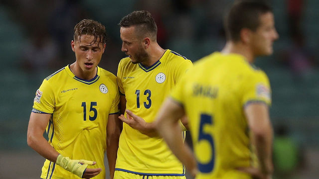 BAKU, AZERBAIJAN - SEPTEMBER 07: Amir Rrahmani of Kososvo speaks to Mergim Vojvodsa of Kosovo after the UEFA Nations League D group four match between Azerbaijan and Kosovo at Baku Olimpiya Stadium on September 7, 2018 in Baku, Azerbaijan.