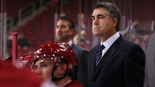 GLENDALE, AZ - OCTOBER 31: Head coach Dave Tippett of the Phoenix Coyotes watches from the bench during the NHL game against the Nashville Predators at Jobing.com Arena on October 31, 2013 in Glendale, Arizona. The Coyotes defeated the Predators 5-4 in an overtime shoot out.