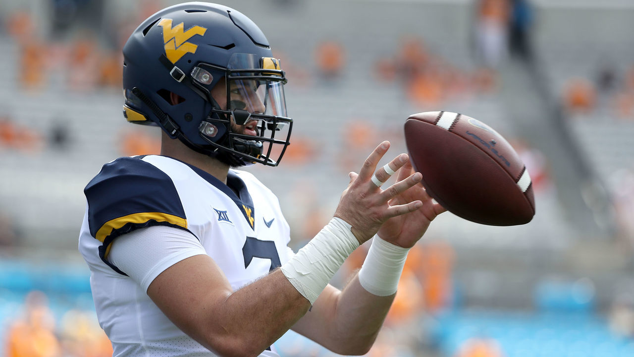 CHARLOTTE, NC - SEPTEMBER 01: Will Grier #7 of the West Virginia Mountaineers warms up before their game against the Tennessee Volunteers at Bank of America Stadium on September 1, 2018 in Charlotte, North Carolina.