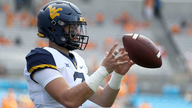 CHARLOTTE, NC - SEPTEMBER 01: Will Grier #7 of the West Virginia Mountaineers warms up before their game against the Tennessee Volunteers at Bank of America Stadium on September 1, 2018 in Charlotte, North Carolina.