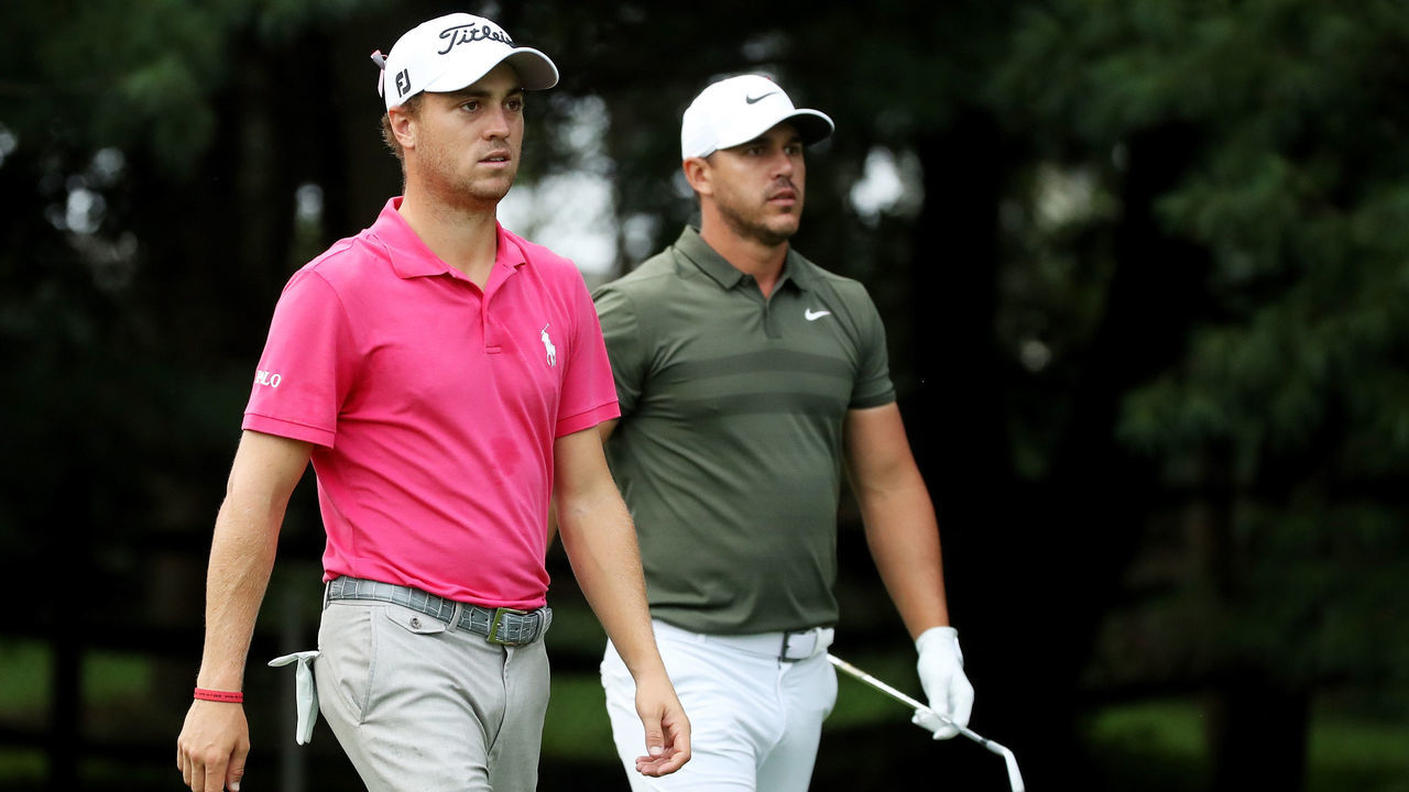 NEWTOWN SQUARE, PA - SEPTEMBER 07: Justin Thomas of the United States and Brooks Koepka of the United States walk from the 13th tee during the second round of the BMW Championship at Aronimink Golf Club on September 7, 2018 in Newtown Square, Pennsylvania.
