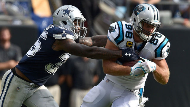 CHARLOTTE, NC - SEPTEMBER 09: Greg Olsen #88 of the Carolina Panthers runs the ball against Kavon Frazier #35 of the Dallas Cowboys in the second quarter during their game at Bank of America Stadium on September 9, 2018 in Charlotte, North Carolina.