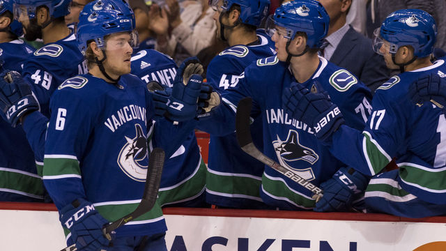 VANCOUVER, BC - SEPTEMBER 17: Brock Boeser #6 of the Vancouver Canucks celebrates with teammates after scoring a goal against the Vegas Golden Knights in NHL pre-season action on September 17, 2017 at Rogers Arena in Vancouver, British Columbia, Canada.