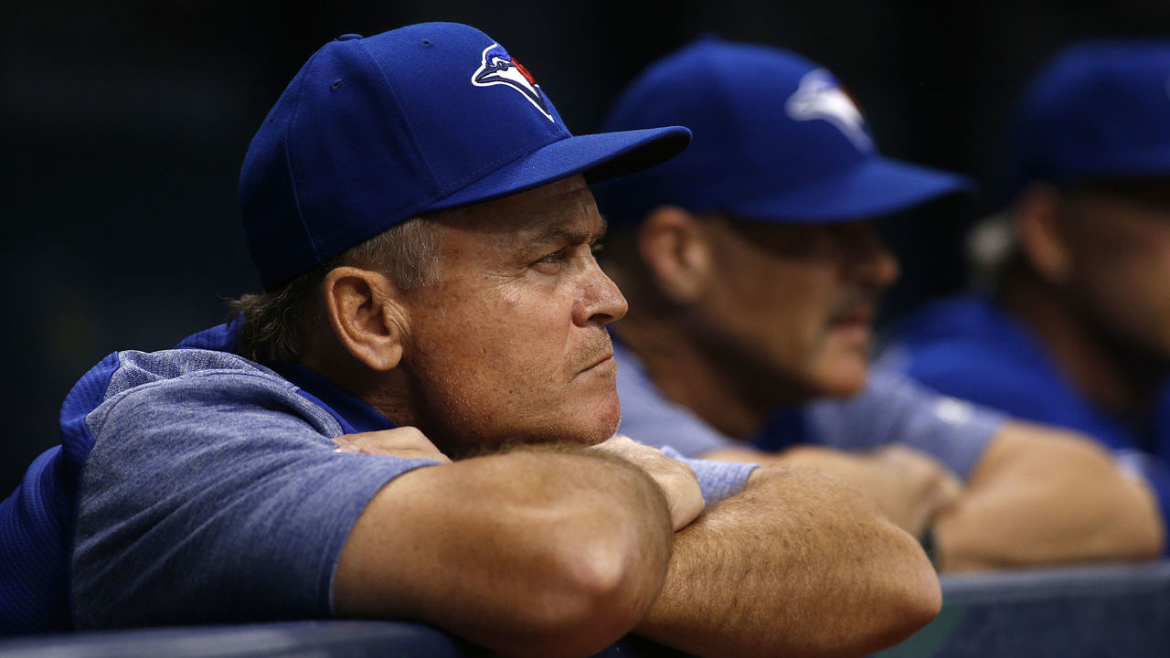 ST. PETERSBURG, FL - JUNE 11: Manager John Gibbons #5 of the Toronto Blue Jays looks on from the dugout during the third inning of a game against the Tampa Bay Rays on June 11, 2018 at Tropicana Field in St. Petersburg, Florida.