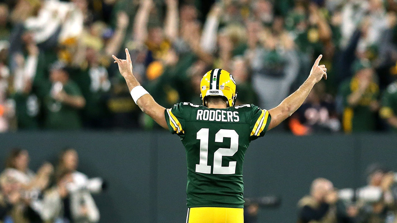 GREEN BAY, WI - SEPTEMBER 09: Aaron Rodgers #12 of the Green Bay Packers reacts after throwing a touchdown pass to Randall Cobb #18 during the fourth quarter of a game against the Chicago Bears at Lambeau Field on September 9, 2018 in Green Bay, Wisconsin.