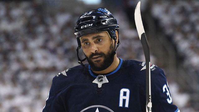 WINNIPEG, MB - MAY 20: Dustin Byfuglien #33 of the Winnipeg Jets reacts during the first period against the Vegas Golden Knights in Game Five of the Western Conference Finals during the 2018 NHL Stanley Cup Playoffs at Bell MTS Place on May 20, 2018 in Winnipeg, Canada.