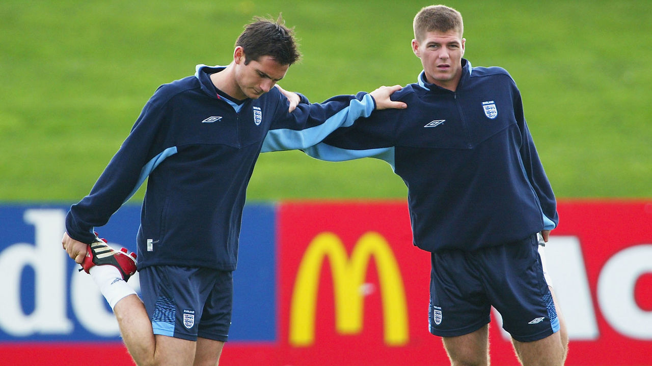 ST ALBANS, ENGLAND - OCTOBER 8: Frank Lampard (L) and Steven Gerrard (R) of England warm up during England's training session at the Colney Hatch training ground on October 8, 2003 in St Albans, England,