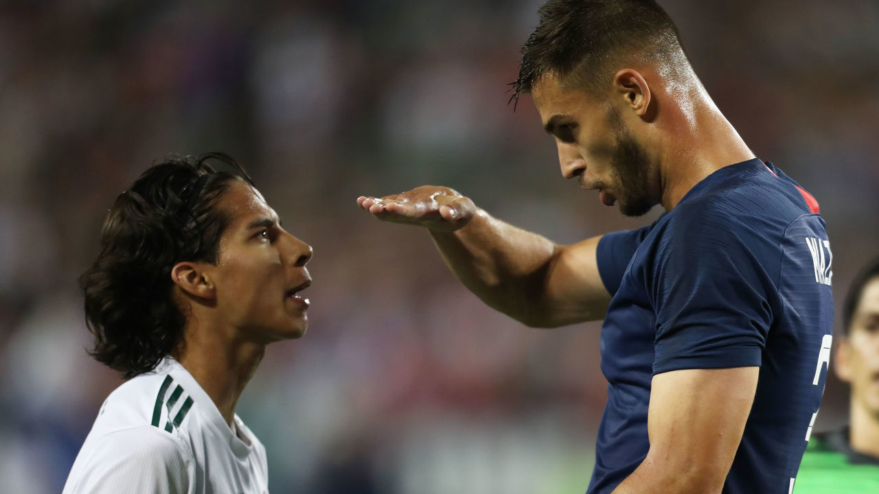 NASHVILLE, TN - SEPTEMBER 11: Diego Lainez of Mexico and Matt Miazga of the United States argue during an international friendly match between Mexico and United States at Nissan Stadium on September 11, 2018 in Nashville, Tennessee.