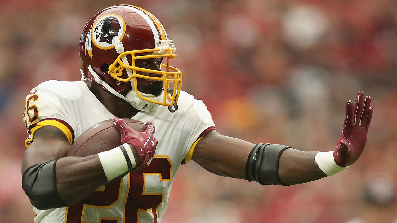 GLENDALE, AZ - SEPTEMBER 09: Running back Adrian Peterson #26 of the Washington Redskins rushes the football against the Arizona Cardinals during the NFL game at State Farm Stadium on September 9, 2018 in Glendale, Arizona. The Redskins defeated the Cardinals 24-6.
