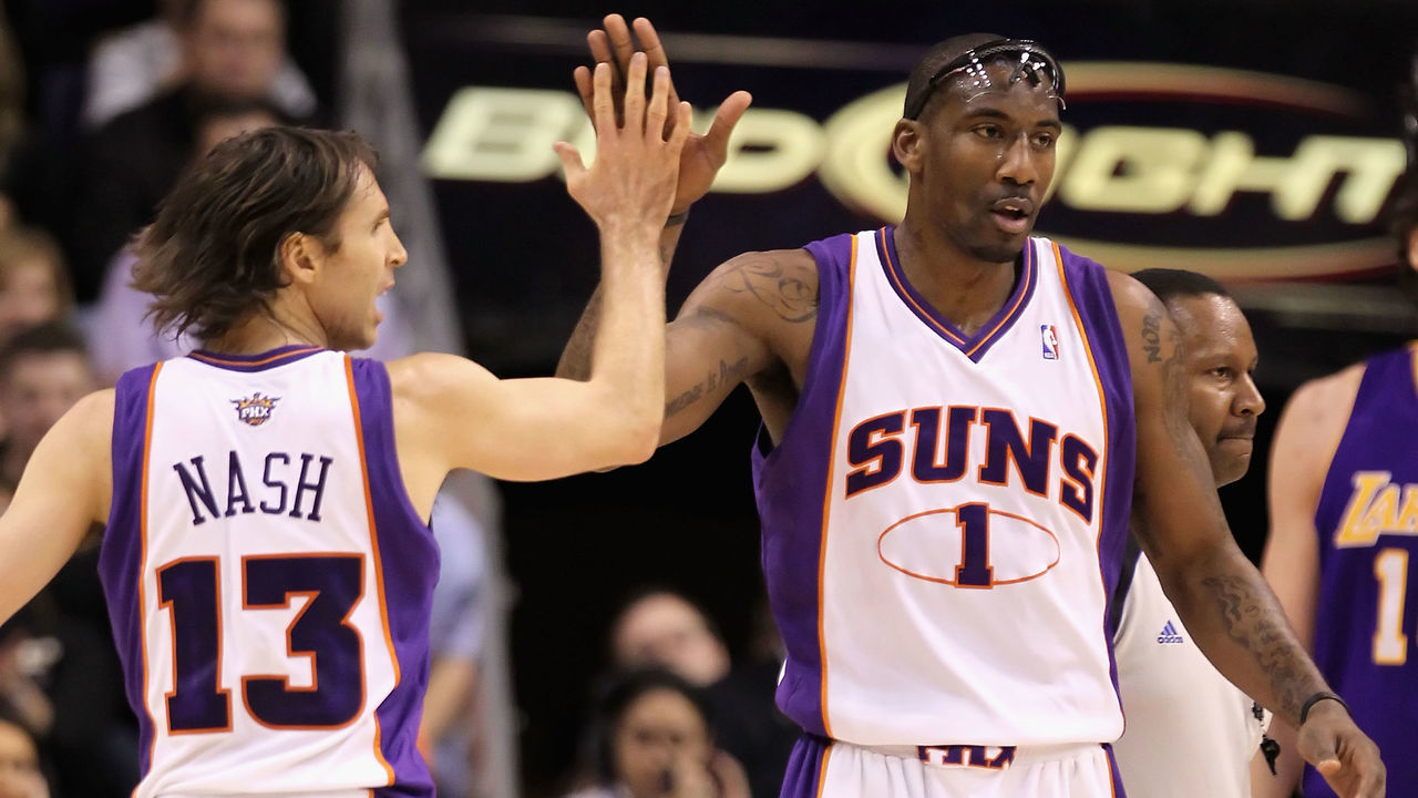 PHOENIX - MARCH 12: Amar'e Stoudemire #1 and Steve Nash #13 of the Phoenix Suns high-five during the NBA game against the Los Angeles Lakers at US Airways Center on March 12, 2010 in Phoenix, Arizona.