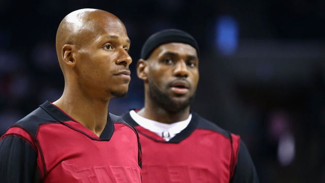 CHARLOTTE, NC - APRIL 28: Ray Allen #34 of the Miami Heat and teammate LeBron James #6 wear a black head band and inside out warm up jersey before their game against the Charlotte Bobcats in Game Four of the Eastern Conference Quarterfinals during the 2014 NBA Playoffs at Time Warner Cable Arena on April 28, 2014 in Charlotte, North Carolina.