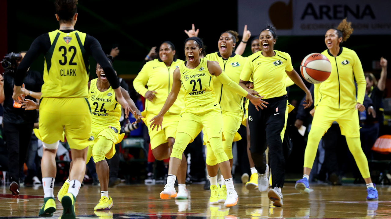 FAIRFAX, VA - SEPTEMBER 12: Members of the Seattle Storm celebrate after defeating the Washington Mystics 98-82 to win the WNBA Finals at EagleBank Arena on September 12, 2018 in Fairfax, Virginia.