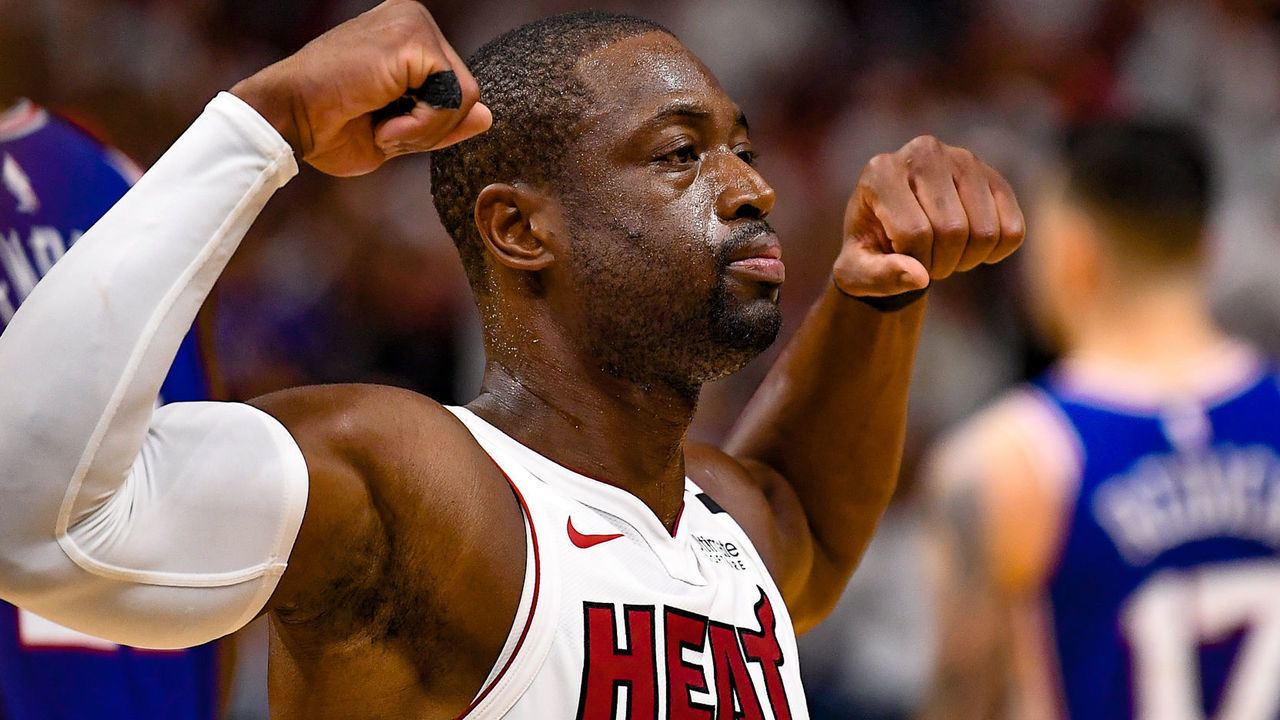 MIAMI, FL - APRIL 21: Dwyane Wade #3 of the Miami Heat flexes his biceps after scoring and getting fouled in the fourth quarter against the Philadelphia 76ers during Game Four of Round One of the 2018 NBA Playoffs at American Airlines Arena on April 21, 2018 in Miami, Florida.