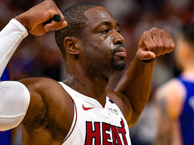 MIAMI, FL - APRIL 21: Dwyane Wade #3 of the Miami Heat flexes his biceps after scoring and getting fouled in the fourth quarter against the Philadelphia 76ers during Game Four of Round One of the 2018 NBA Playoffs at American Airlines Arena on April 21, 2018 in Miami, Florida.