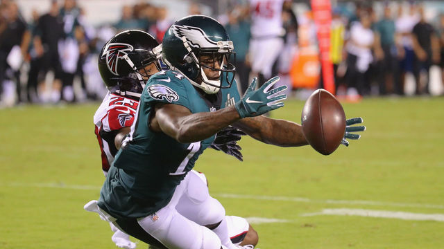 PHILADELPHIA, PA - SEPTEMBER 06: Mike Wallace #14 of the Philadelphia Eagles attempts to catch the ball as he is defended by Robert Alford #23 of the Atlanta Falcons during the second half at Lincoln Financial Field on September 6, 2018 in Philadelphia, Pennsylvania.