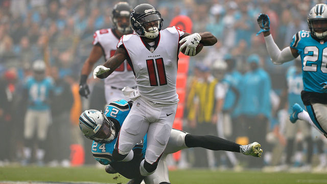 CHARLOTTE, NC - NOVEMBER 05: James Bradberry #24 of the Carolina Panthers tackles Julio Jones #11 of the Atlanta Falcons in the first quarter during their game at Bank of America Stadium on November 5, 2017 in Charlotte, North Carolina.