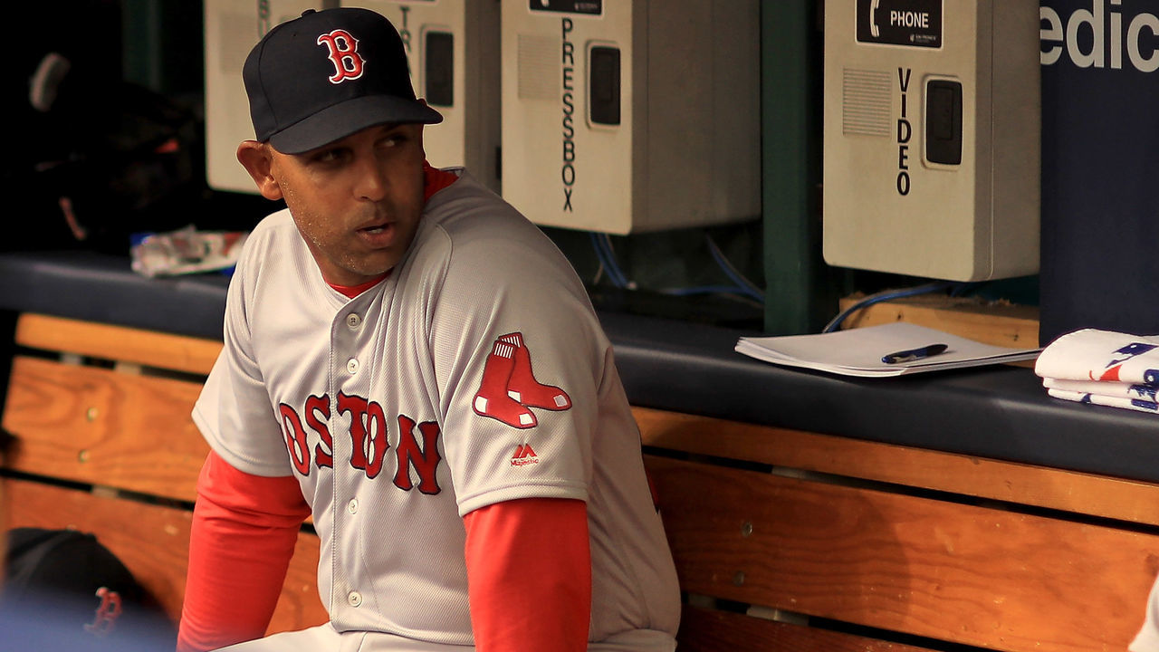 ST PETERSBURG, FL - MARCH 29: Manager Alex Cora #20 of the Boston Red Sox looks on before a game against the Tampa Bay Rays on Opening Day at Tropicana Field on March 29, 2018 in St Petersburg, Florida.
