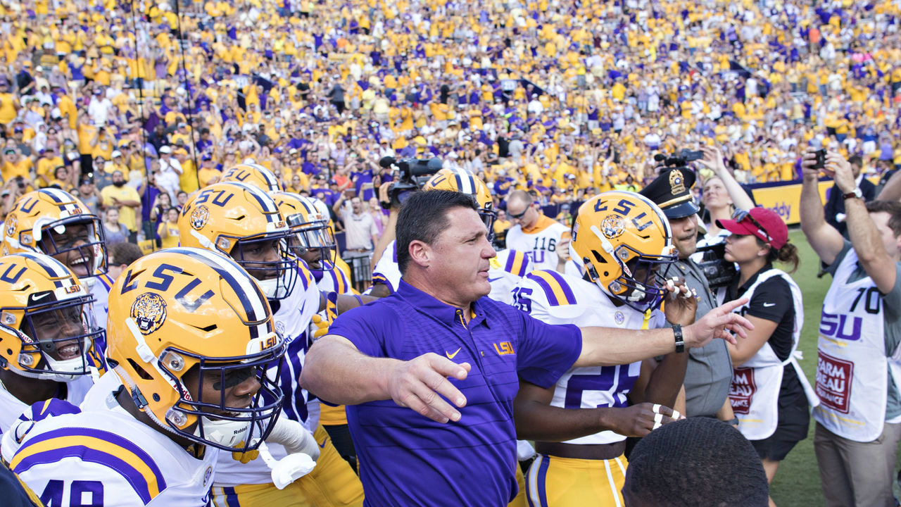 BATON ROUGE, LA - OCTOBER 14: Head Coach Ed Orgeron of the LSU Tigers leads his team onto the field before a game against the Auburn Tigers at Tiger Stadium on October 14, 2017 in Baton Rouge, Louisiana.
