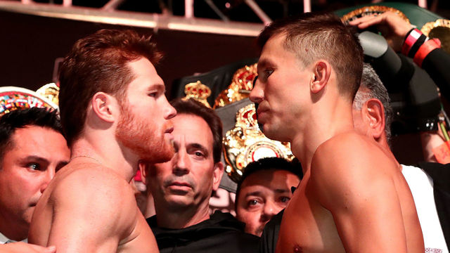 LAS VEGAS, NV - SEPTEMBER 14: Canelo Alvarez (L) and WBC/WBA middleweight champion Gennady Golovkin are held back after facing off during their official weigh-in at T-Mobile Arena on September 13, 2018 in Las Vegas, Nevada. Golovkin will defend his titles against Alvarez in a rematch on September 15 at T-Mobile Arena.