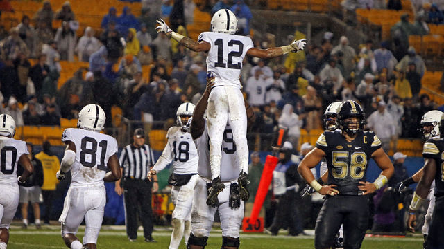 PITTSBURGH, PA - SEPTEMBER 08: Mac Hippenhammer #12 of the Penn State Nittany Lions celebrates with C.J. Thorpe #69 of the Penn State Nittany Lions after catching a 11 yard touchdown pass against the Pittsburgh Panthers in the fourth quarter on September 8, 2018 at Heinz Field in Pittsburgh, Pennsylvania.