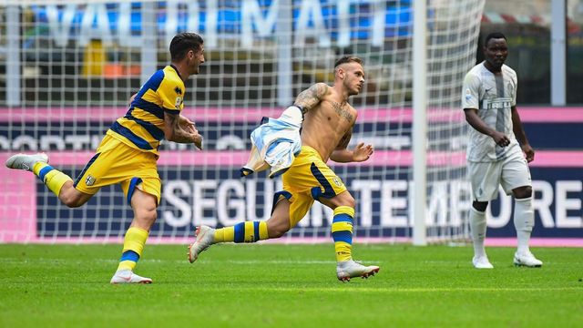 Parma's Italian defender Federico Dimarco (C) celebrates after opening the scoring during the Italian Serie A football match Inter Milan vs Parma on September 15, 2018 at the San Siro stadium in Milan.