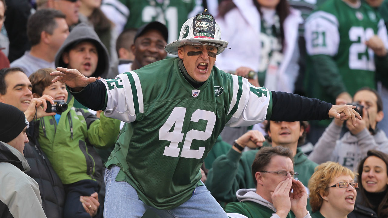 EAST RUTHERFORD, NJ - NOVEMBER 21: Ed Anzalone, alias Fireman Eddie, super fan of the New York Jets leads a cheer against the Houston Texans during their game on November21, 2010 at the New Meadowlands Stadium in East Rutherford, New Jersey.
