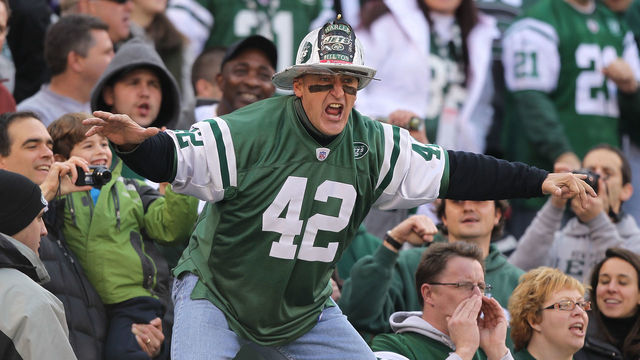 EAST RUTHERFORD, NJ - NOVEMBER 21: Ed Anzalone, alias Fireman Eddie, super fan of the New York Jets leads a cheer against the Houston Texans during their game on November21, 2010 at the New Meadowlands Stadium in East Rutherford, New Jersey.