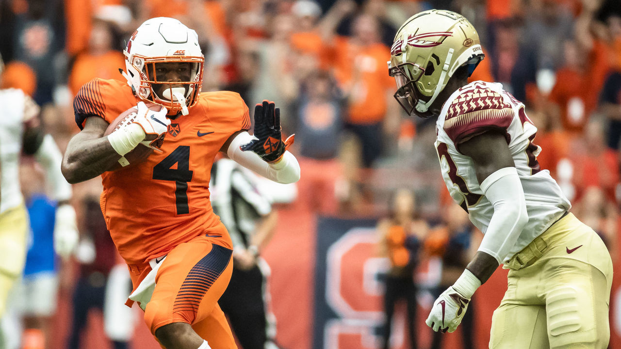 SYRACUSE, NY - SEPTEMBER 15: Dontae Strickland #4 of the Syracuse Orange carries the ball during the first half against the Florida State Seminoles at the Carrier Dome on September 15, 2018 in Syracuse, New York.