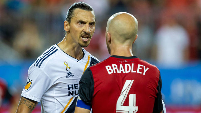 TORONTO, ON - SEPTEMBER 15: Zlatan Ibrahimovic (9) of LA Galaxy scores exchanges words with Michael Bradley (4) of Toronto FC during the second half of the MLS regular season match on September 15, 2018, at BMO Field in Toronto, ON, Canada.
