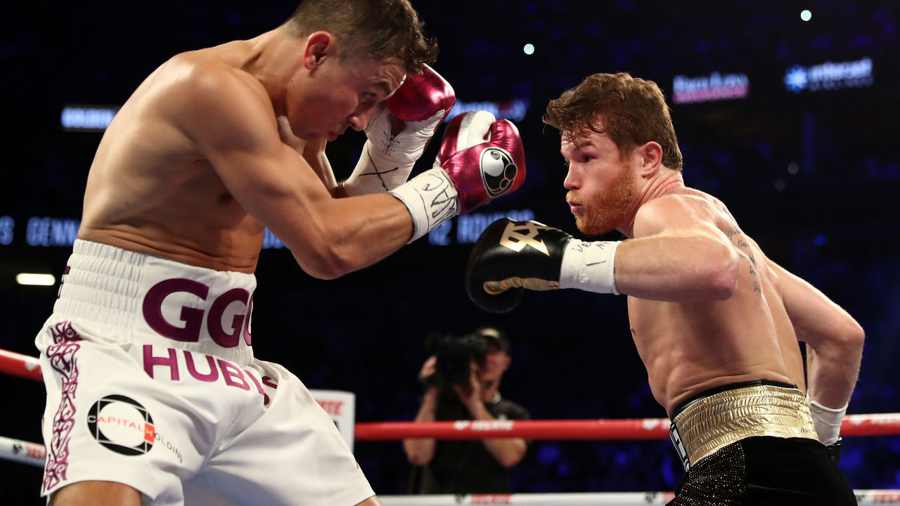 LAS VEGAS, NV - SEPTEMBER 15: Gennady Golovkin and Canelo Alvarez exchange punches during their WBC/WBA middleweight title fight at T-Mobile Arena on September 15, 2018 in Las Vegas, Nevada.