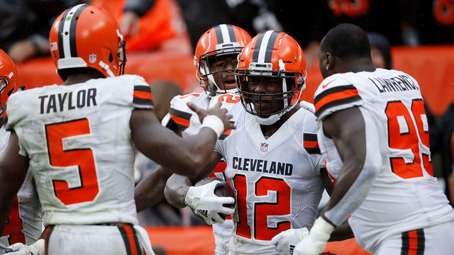CLEVELAND, OH - SEPTEMBER 09: Josh Gordon #12 celebrates his touchdown with Tyrod Taylor #5 and Devaroe Lawrence #99 of the Cleveland Browns during the fourth quarter against the Pittsburgh Steelers at FirstEnergy Stadium on September 9, 2018 in Cleveland, Ohio.