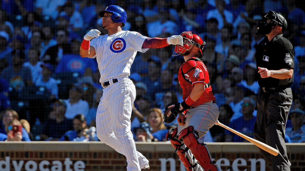CHICAGO, IL - SEPTEMBER 16: Willson Contreras #40 of the Chicago Cubs tosses his bat as he watches his double against the Cincinnati Reds during the fifth inning at Wrigley Field on September 16, 2018 in Chicago, Illinois.